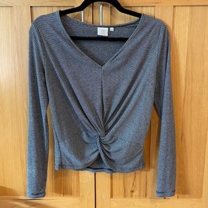 Good luck gem, size small, black striped shirt!